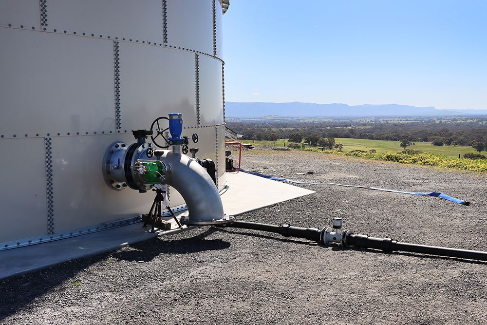 Water tank connected to rural pipeline  