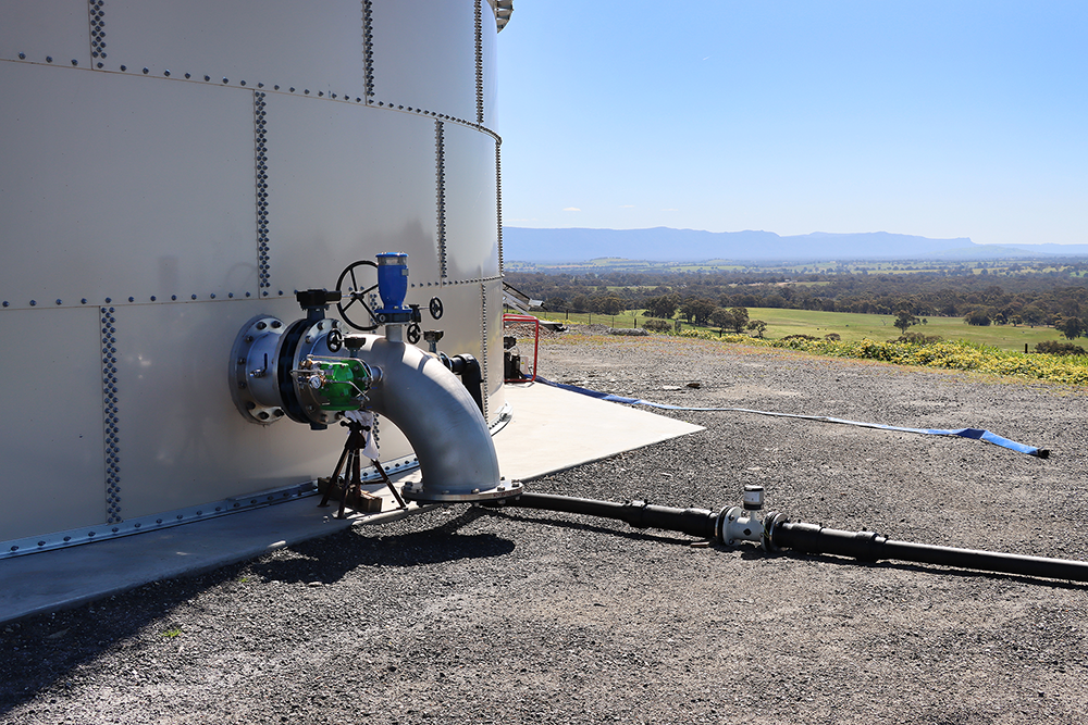 Water tank connected to rural pipeline
