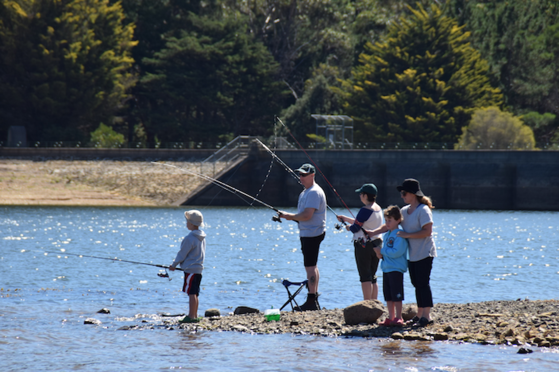 Family of 5 fishing at Lauriston lake.