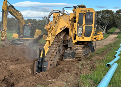 Vermeer Track Trenching for large PVC Pipe