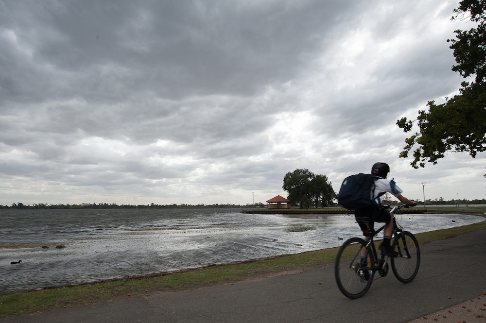 Boy cycling at Lake Wendouree  
